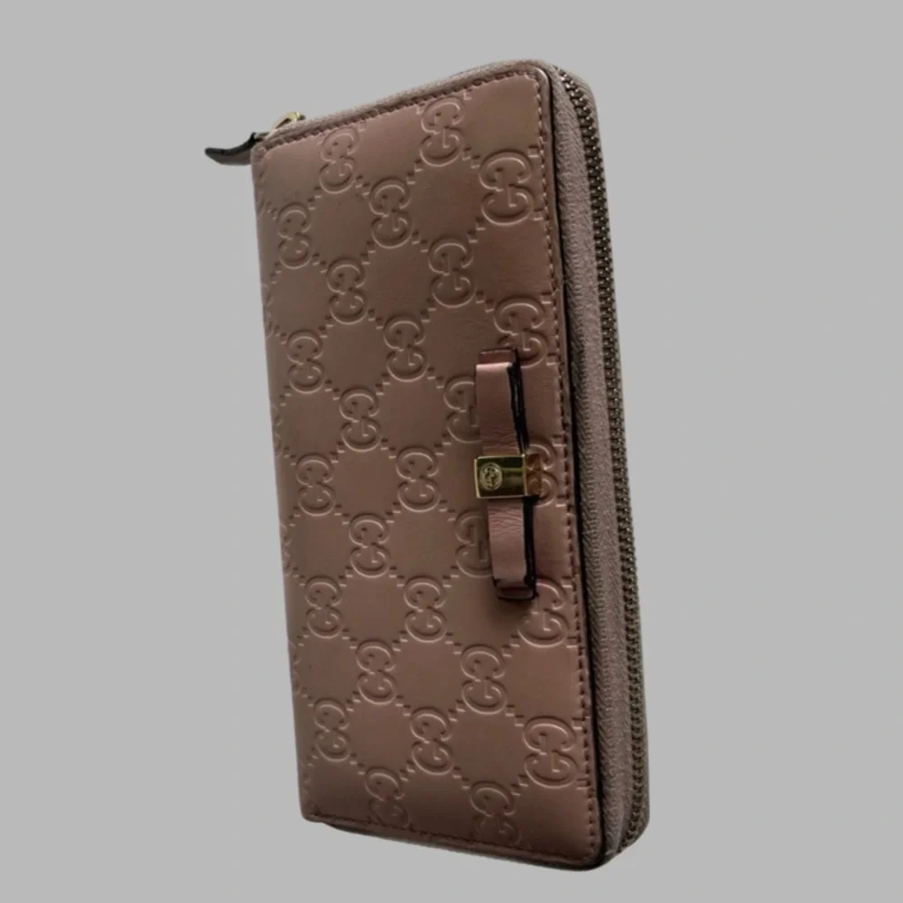 Gucci Pink Embossed Wallet